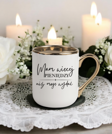 Kubek z serii elegant z afirmacja " Mam więcej pieniędzy ,niż mogę wydać "